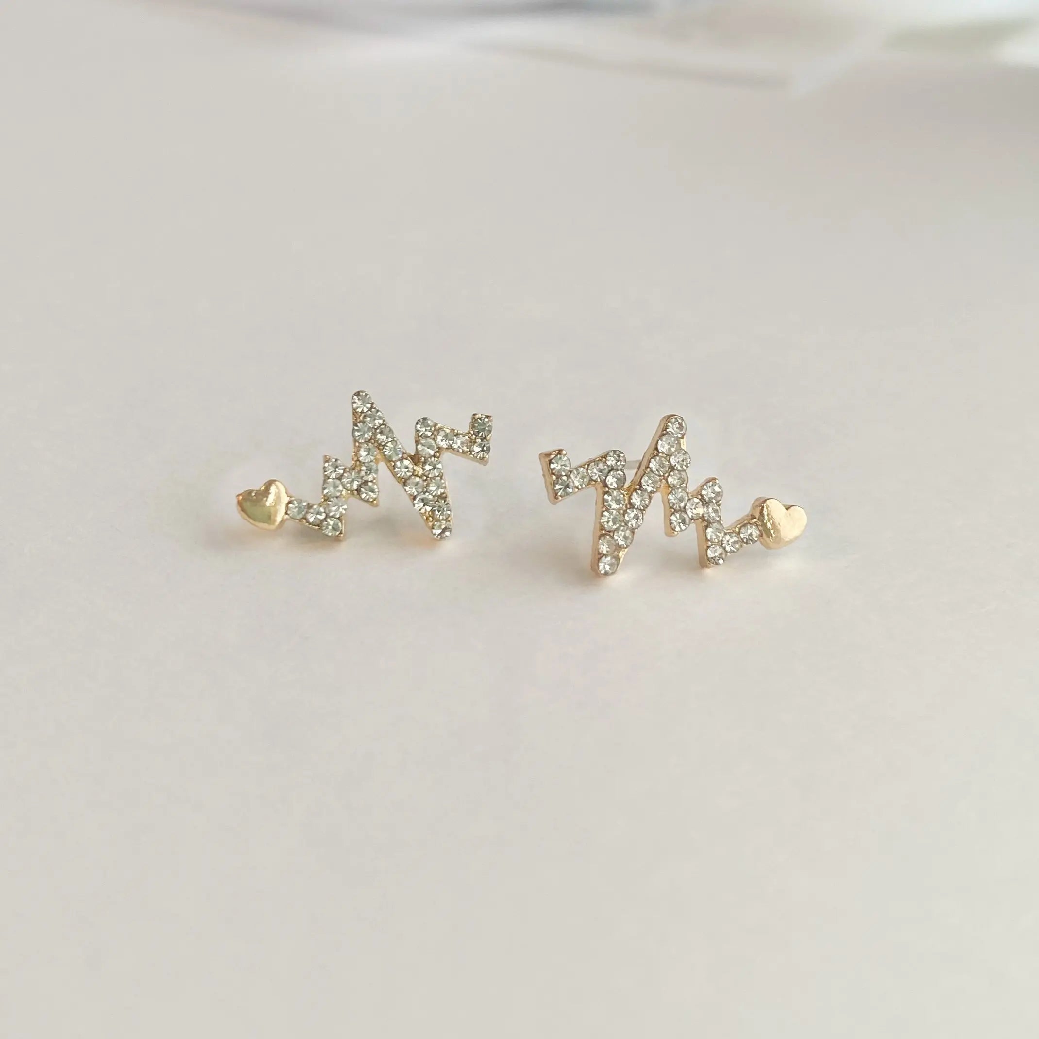 Heartbeat earrings on sale